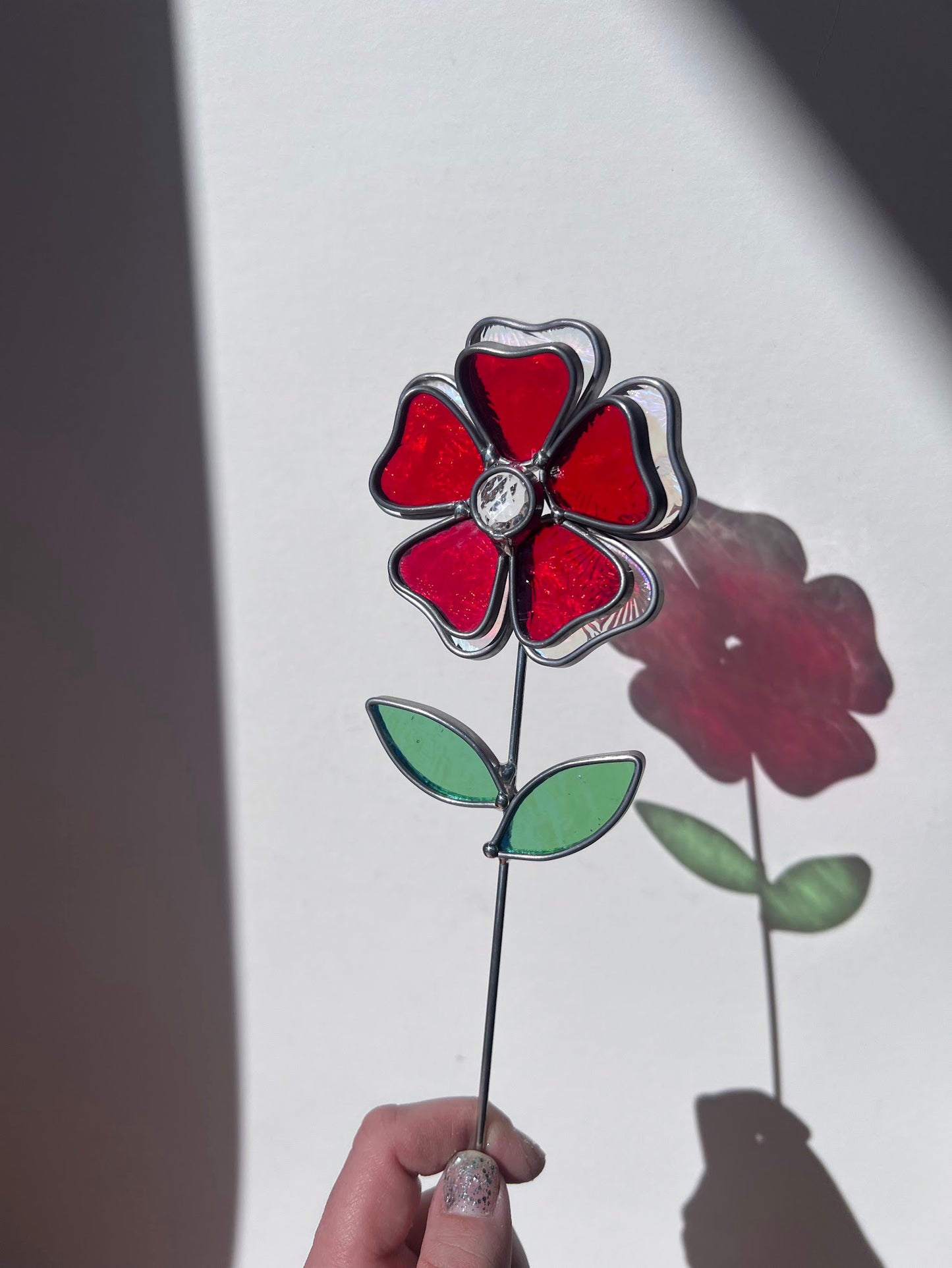 Deep Ruby Red and Rainbow Iridescent Stained Glass Flower with Faceted Round Gem Center