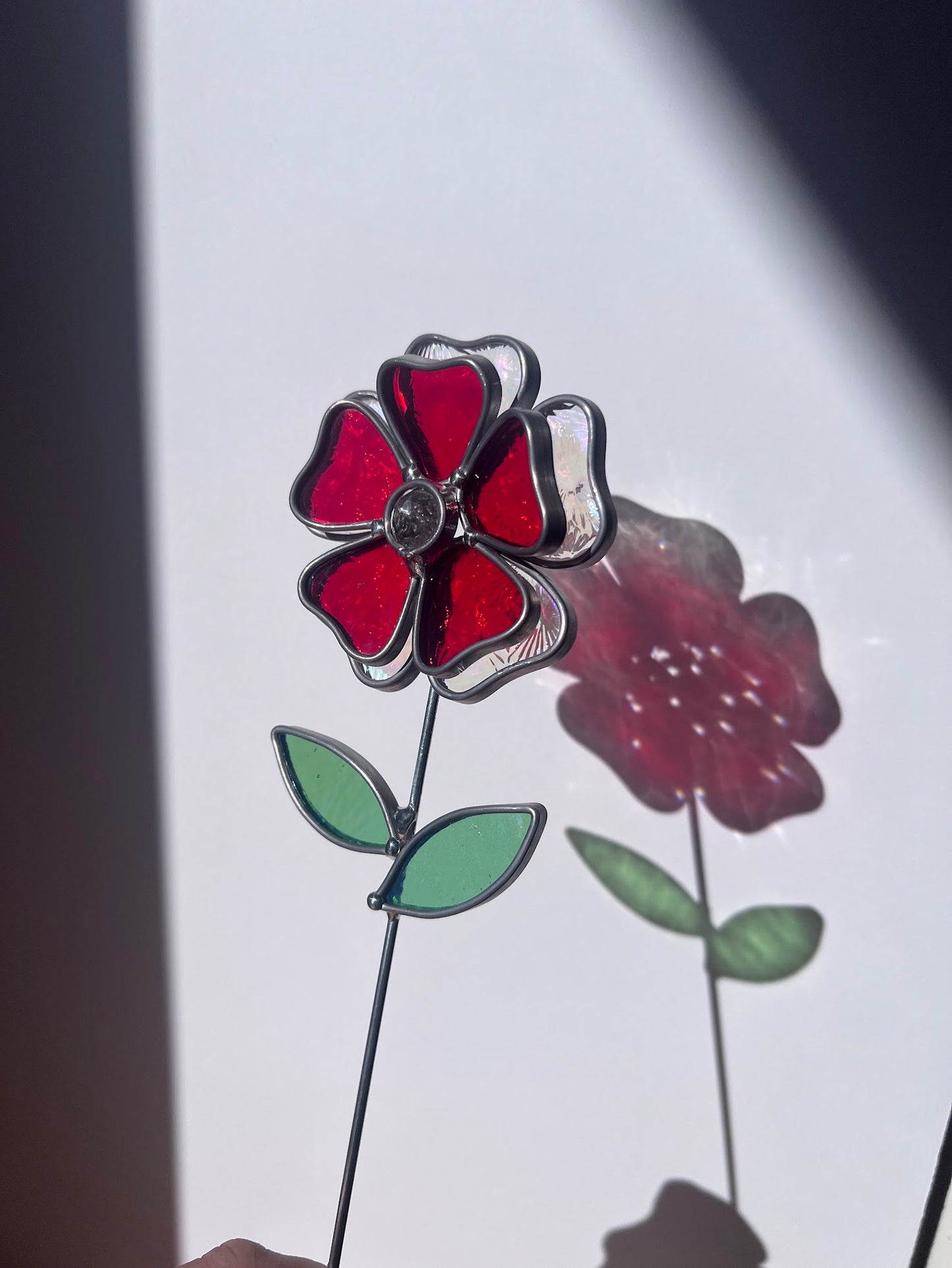 Deep Ruby Red and Rainbow Iridescent Stained Glass Flower with Faceted Round Gem Center