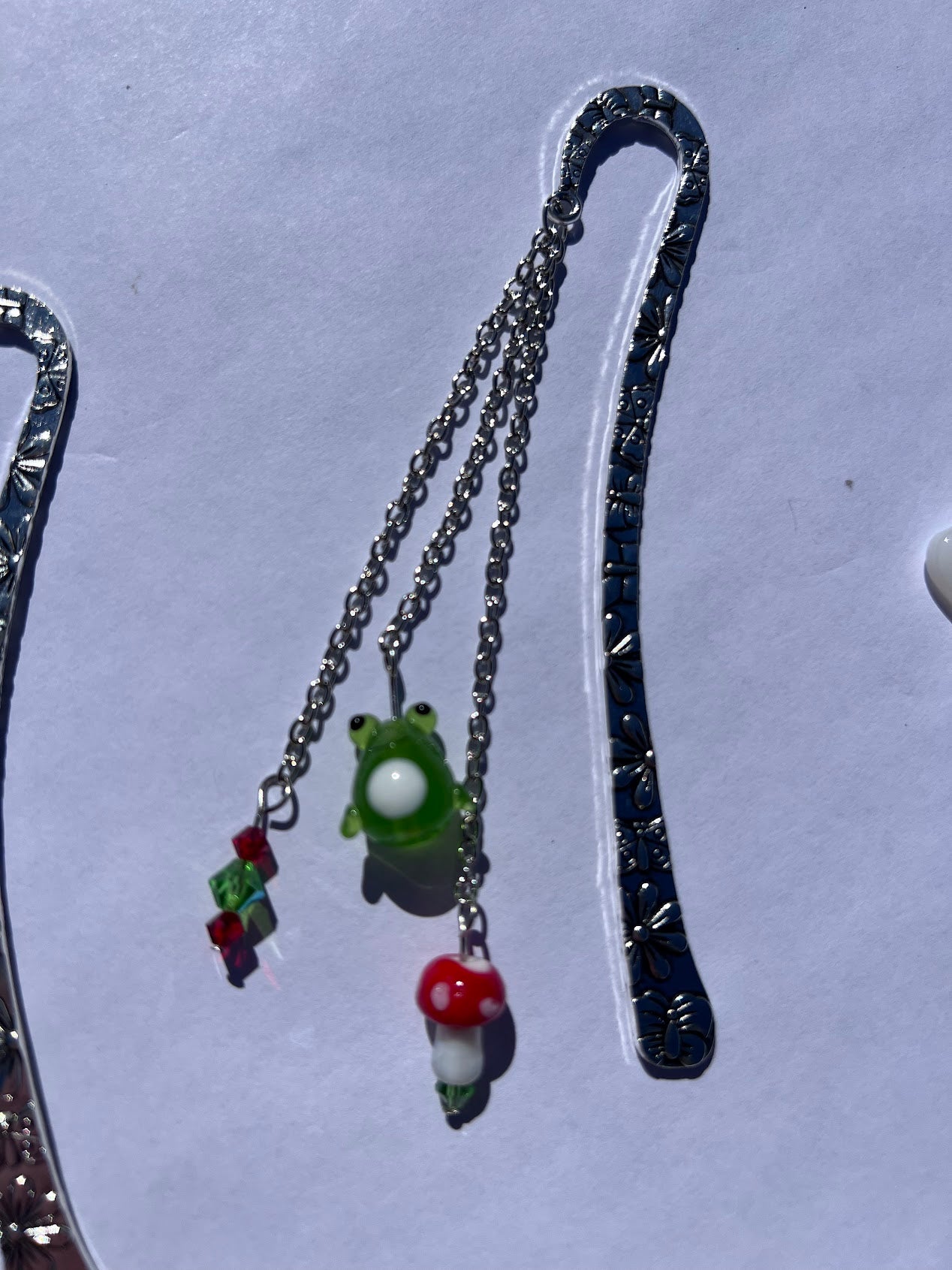 Whimsical Froggy Mushroom Metal Bookmark! Carefully crafted with the love of crystal and glass beads to make the perfect reading companion!