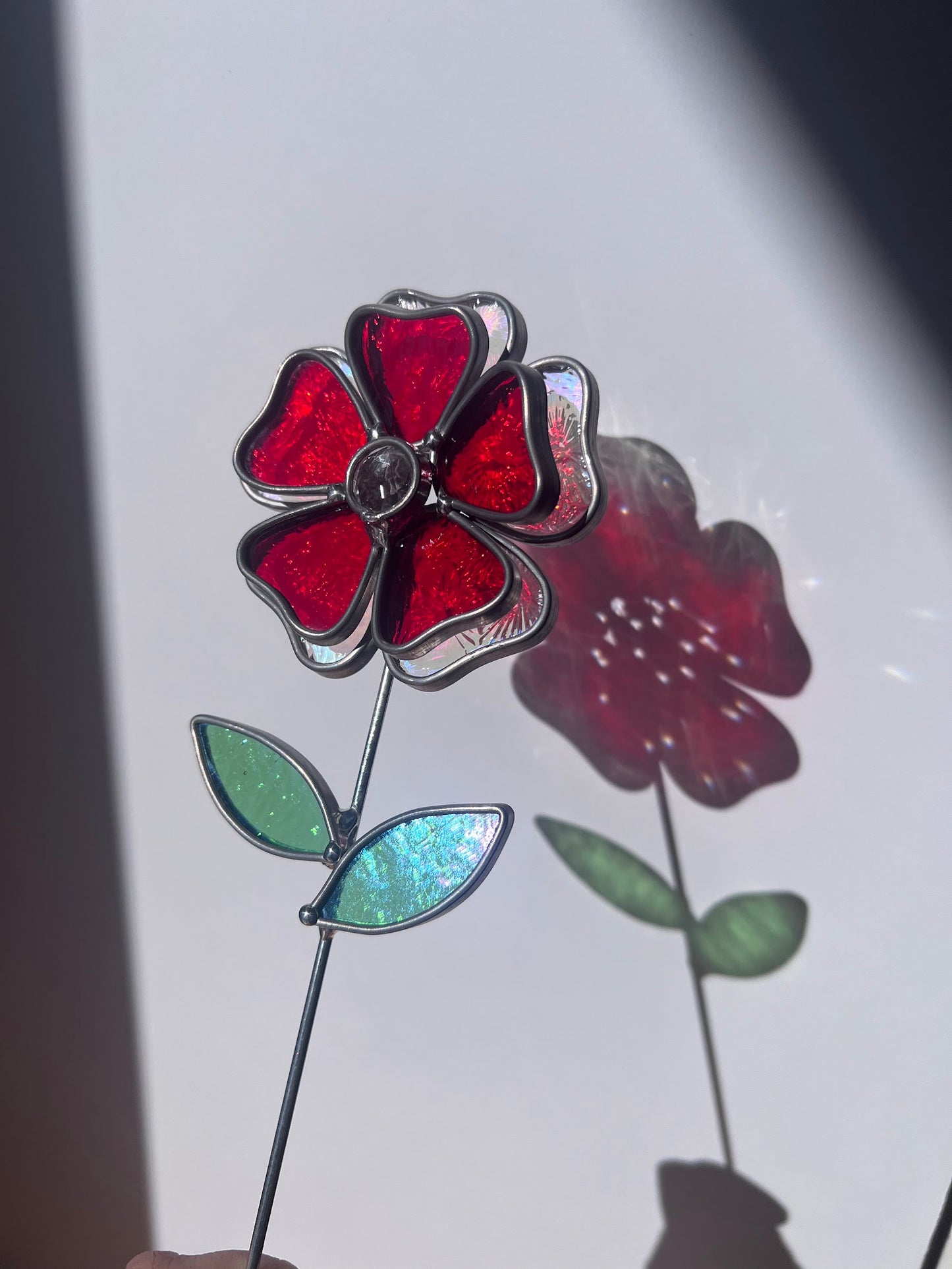 Deep Ruby Red and Rainbow Iridescent Stained Glass Flower with Faceted Round Gem Center