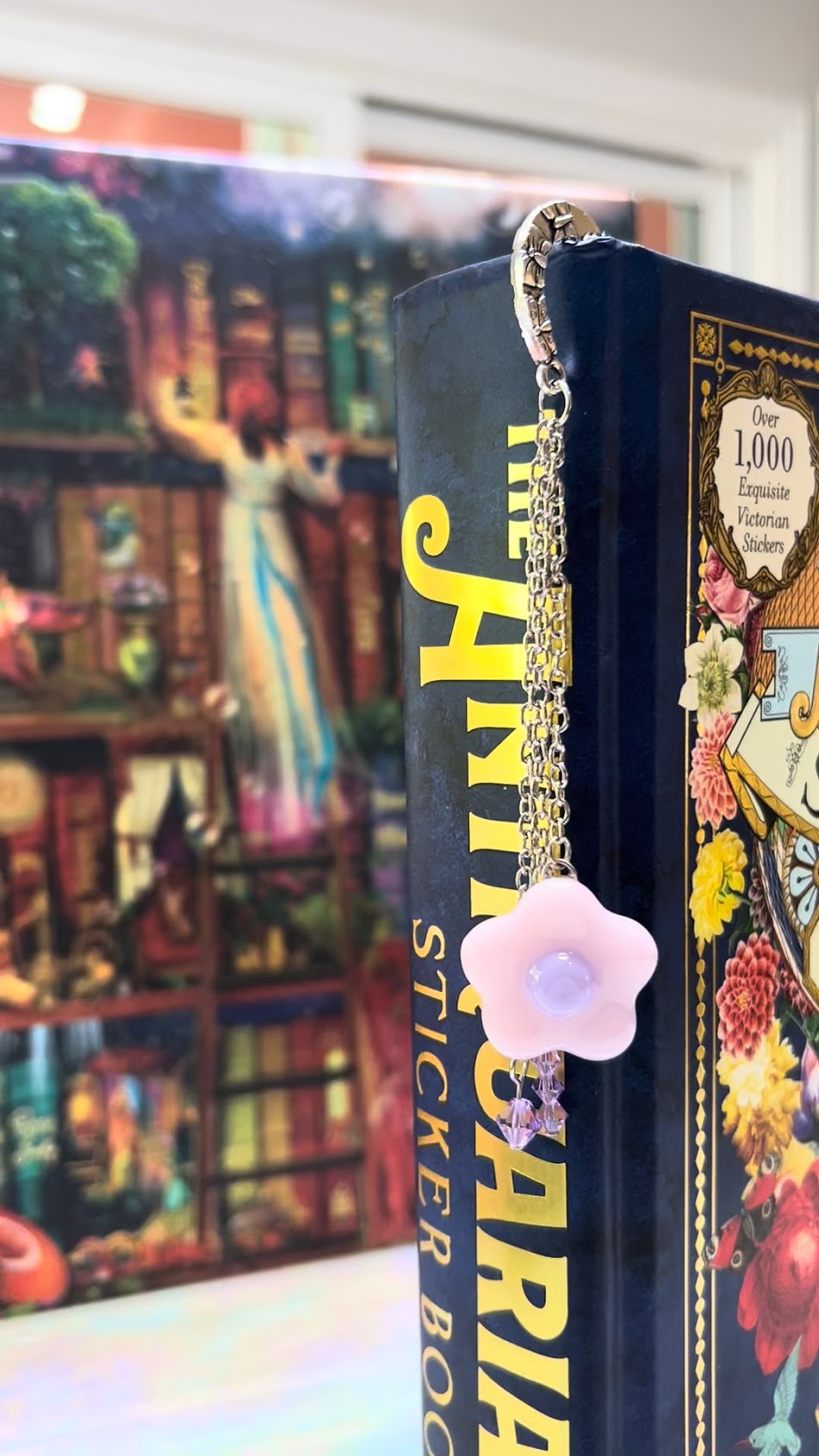 Adorable Baby Pink Stained Glass Fused Daisy and Crystal Bead Metal Bookmark! Carefully crafted with crystal beads and a stained glass daisy to elevate the cuteness vibes as you read!