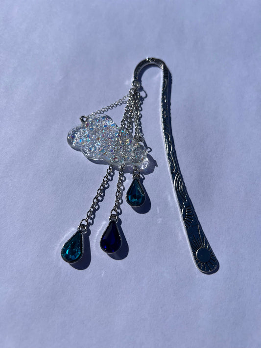 Dichroic Glass Cloud, Quartz & Crystal Bead Metal Bookmark! Carefully crafted with a handmade dichroic glass moon, quartz & crystal bead to help elevate your starry dreams as you read!
