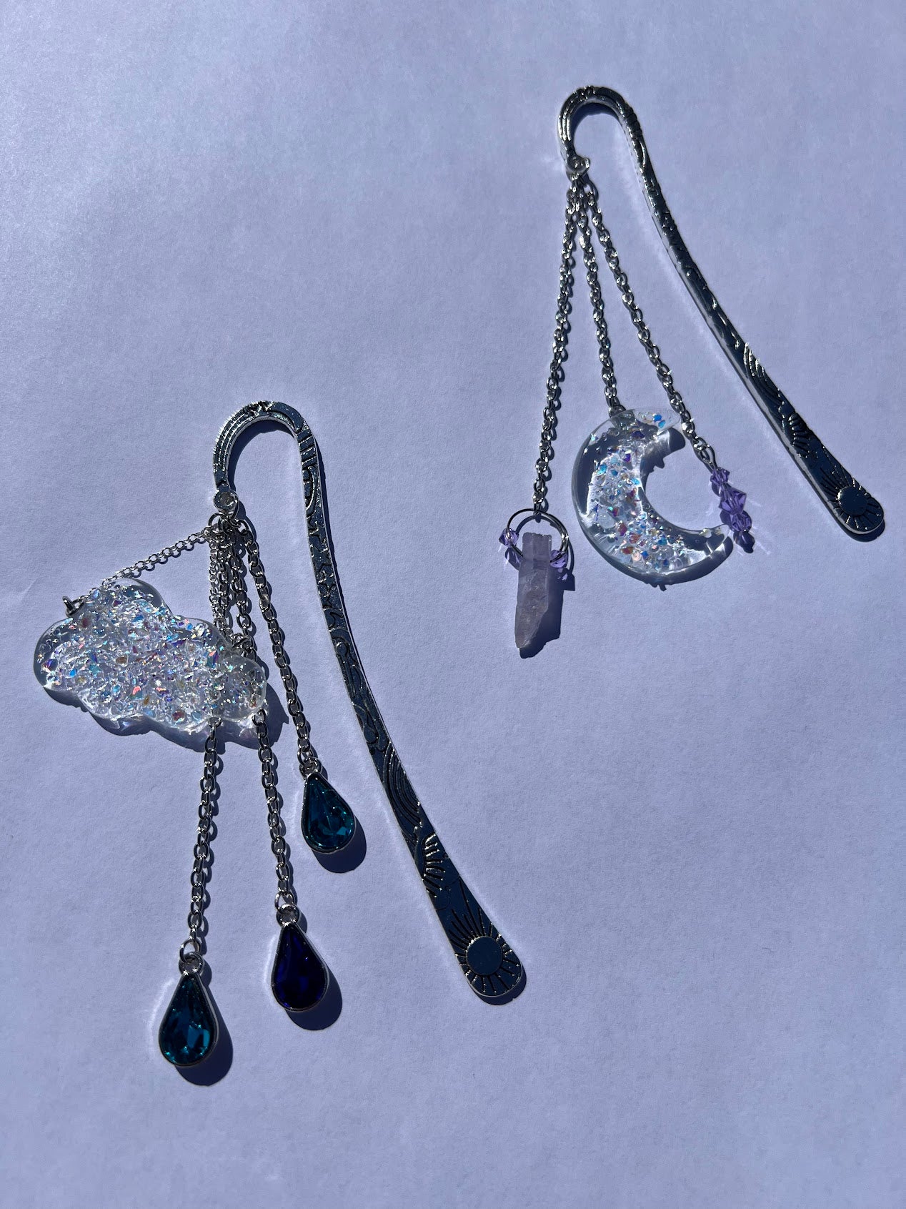 Dichroic Glass Moon, Quartz & Crystal Bead Metal Bookmark! Carefully crafted with a handmade dichroic glass moon, quartz & crystal bead to help elevate your starry dreams as you read!