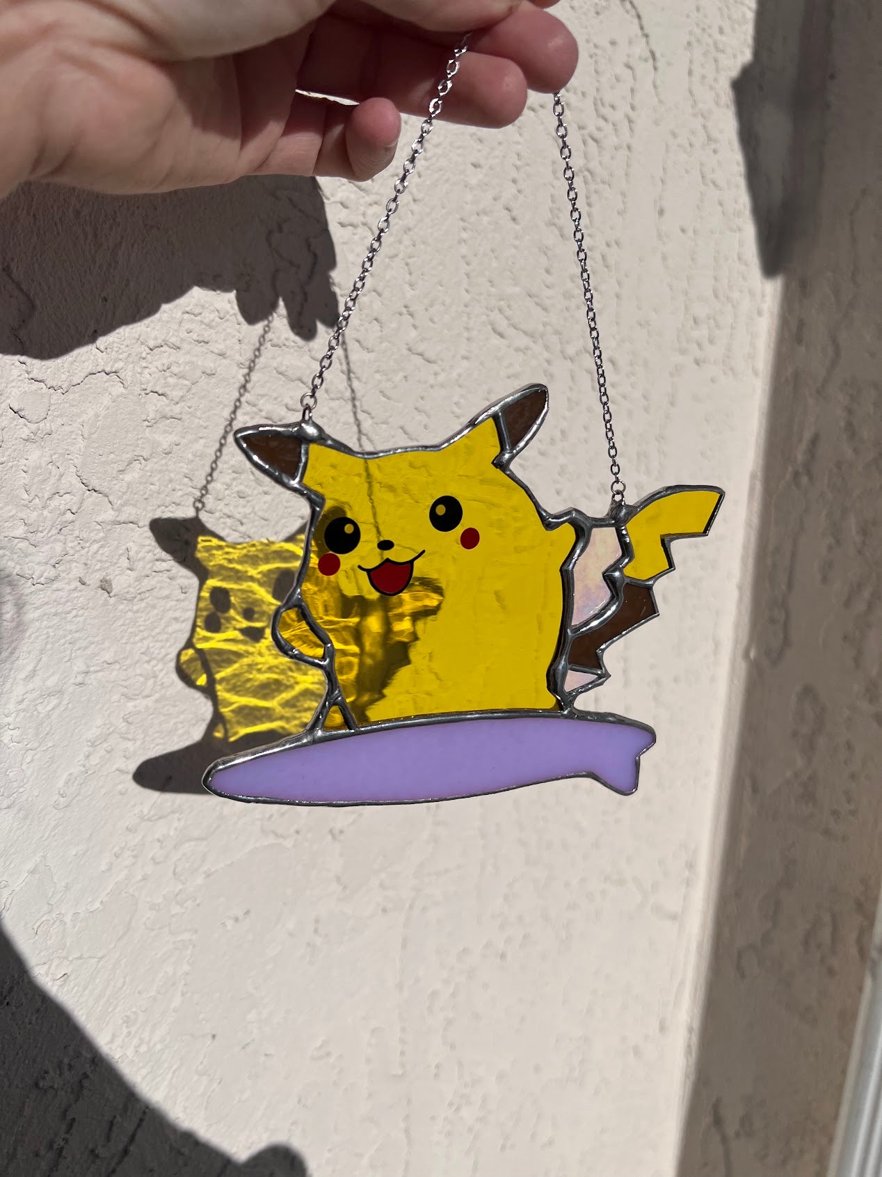 Stained Glass Surfing Pikachu Inspired Hanging Window Suncatcher! So cute! Made with Yellow, Purple, Brown & Iridescent stained glass!